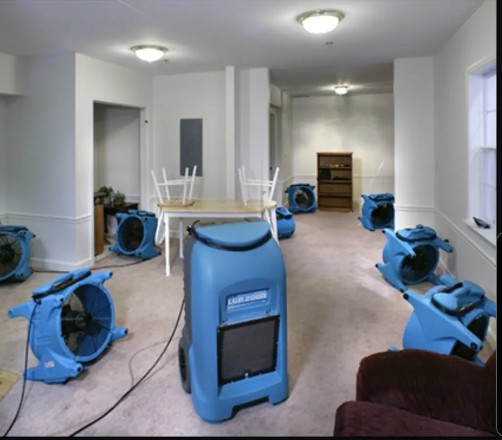 Air movers and dehumidifier setup for Water Damage Restoration in Griswold