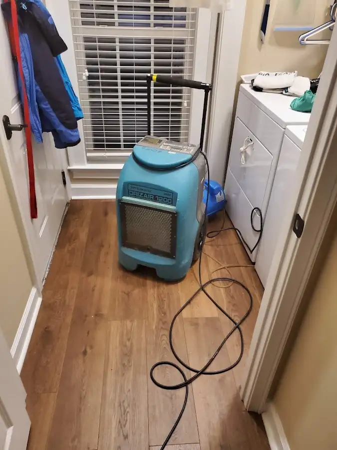 Commercial dehumidifier deployed for Flood Damage Cleanup in Griswold